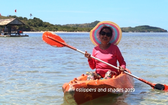 our Momshie as she paddled on the clear water